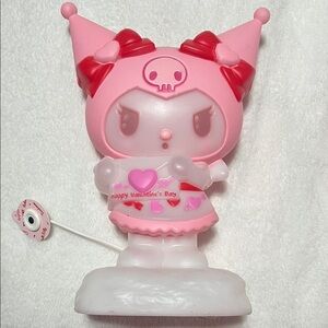 Pink and White Figurine with Heart Details